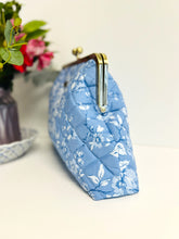 Load image into Gallery viewer, Quilted cotton clutch purse with 8" wide metal frame - blue floral