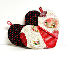 Load image into Gallery viewer, Valentine's Day potholders; Heart-shaped potholders; Quilted pot holders; Romantic kitchen accessories; Love-themed potholders; Valentine's Day kitchen décor; Heart quilted hot pads; Handmade Valentine's gifts; Kitchen essentials for Valentine's; Heart quilted trivets; Romantic home décor; Couples' cooking accessories; Valentine's Day cooking gifts; Red and pink potholders; Unique kitchen Valentine's gifts