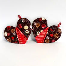 Load image into Gallery viewer, Valentine's Day potholders; Heart-shaped potholders; Quilted pot holders; Romantic kitchen accessories; Love-themed potholders; Valentine's Day kitchen décor; Heart quilted hot pads; Handmade Valentine's gifts; Kitchen essentials for Valentine's; Heart quilted trivets; Romantic home décor; Couples' cooking accessories; Valentine's Day cooking gifts; Red and pink potholders; Unique kitchen Valentine's gifts