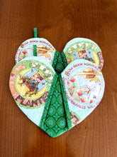 Load image into Gallery viewer, Valentine's Day potholders; Heart-shaped potholders; Quilted pot holders; Romantic kitchen accessories; Love-themed potholders; Valentine's Day kitchen décor; Heart quilted hot pads; Handmade Valentine's gifts; Kitchen essentials for Valentine's; Heart quilted trivets; Romantic home décor; Couples' cooking accessories; Valentine's Day cooking gifts; Red and pink potholders; Unique kitchen Valentine's gifts