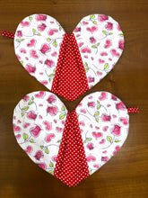 Load image into Gallery viewer, Valentine's Day potholders; Heart-shaped potholders; Quilted pot holders; Romantic kitchen accessories; Love-themed potholders; Valentine's Day kitchen décor; Heart quilted hot pads; Handmade Valentine's gifts; Kitchen essentials for Valentine's; Heart quilted trivets; Romantic home décor; Couples' cooking accessories; Valentine's Day cooking gifts; Red and pink potholders; Unique kitchen Valentine's gifts