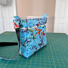 Load image into Gallery viewer, Messenger bag; 
Crossbody bag;
Messenger style crossbody bag;
Quilted Cotton crossbody messenger bag
Women&#39;s crossbody messenger bag
Urban messenger bag
Eco-friendly messenger bag
Crossbody bag for traveler bag
Adjustable strap messenger bag
Stylish crossbody bag
