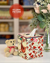 Load image into Gallery viewer, Decorative tissue box cover with a teddy bear and flowers on a blurred bookshelf background
