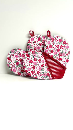 Valentine's Day potholders; Heart-shaped potholders; Quilted pot holders; Romantic kitchen accessories; Love-themed potholders; Valentine's Day kitchen décor; Heart quilted hot pads; Handmade Valentine's gifts; Kitchen essentials for Valentine's; Heart quilted trivets; Romantic home décor; Couples' cooking accessories; Valentine's Day cooking gifts; Red and pink potholders; Unique kitchen Valentine's gifts