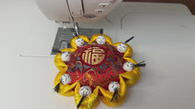 Load and play video in Gallery viewer, Vintage Pincushion with eight little persons, Silk pincushion - yellow
